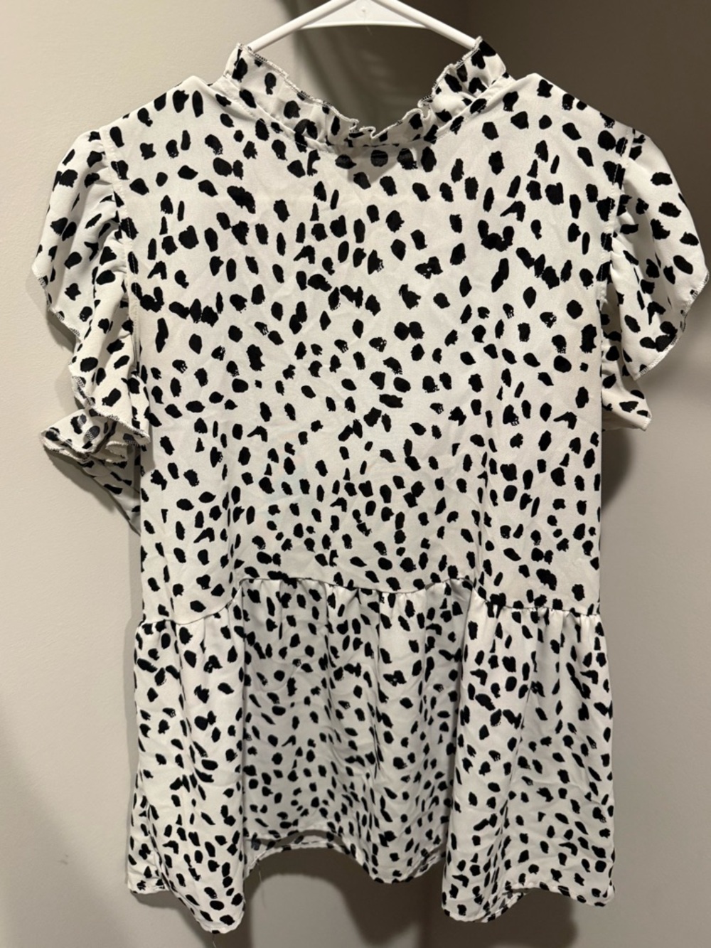 Black Spot Print Ruffle Neck Peplum Top